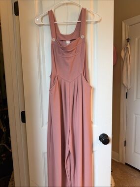 HALARA Wide-Leg Jumpsuit in Dusty Rose. Adjustable w/ pockets. NWOT